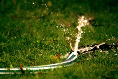 close-up-photography-of-water-bursting-out-of-hose-666013